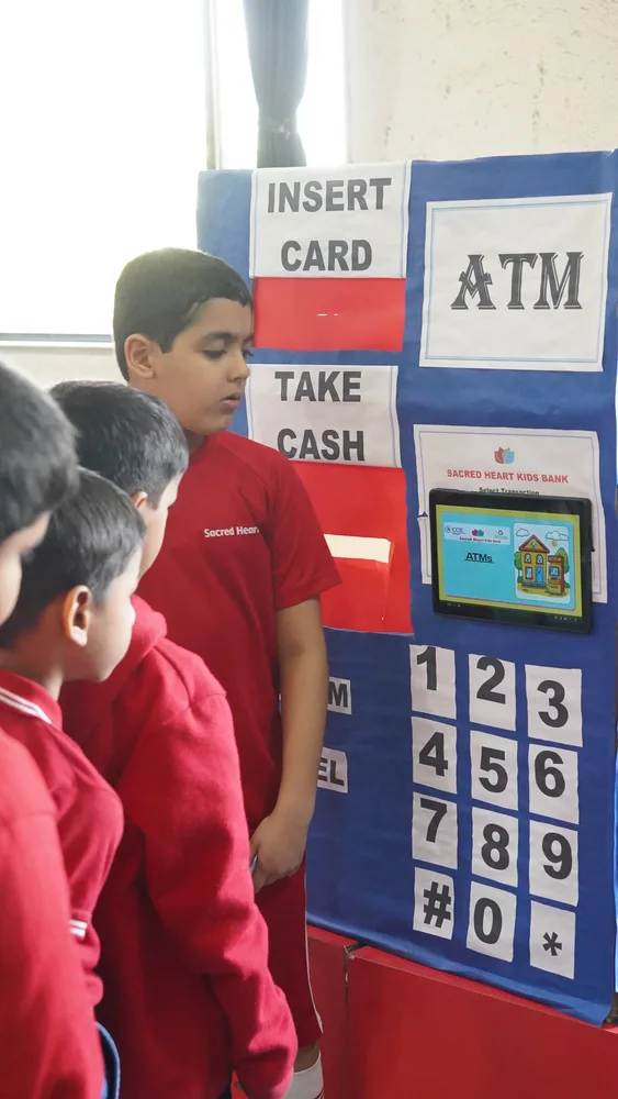 Primary students at a bank activity