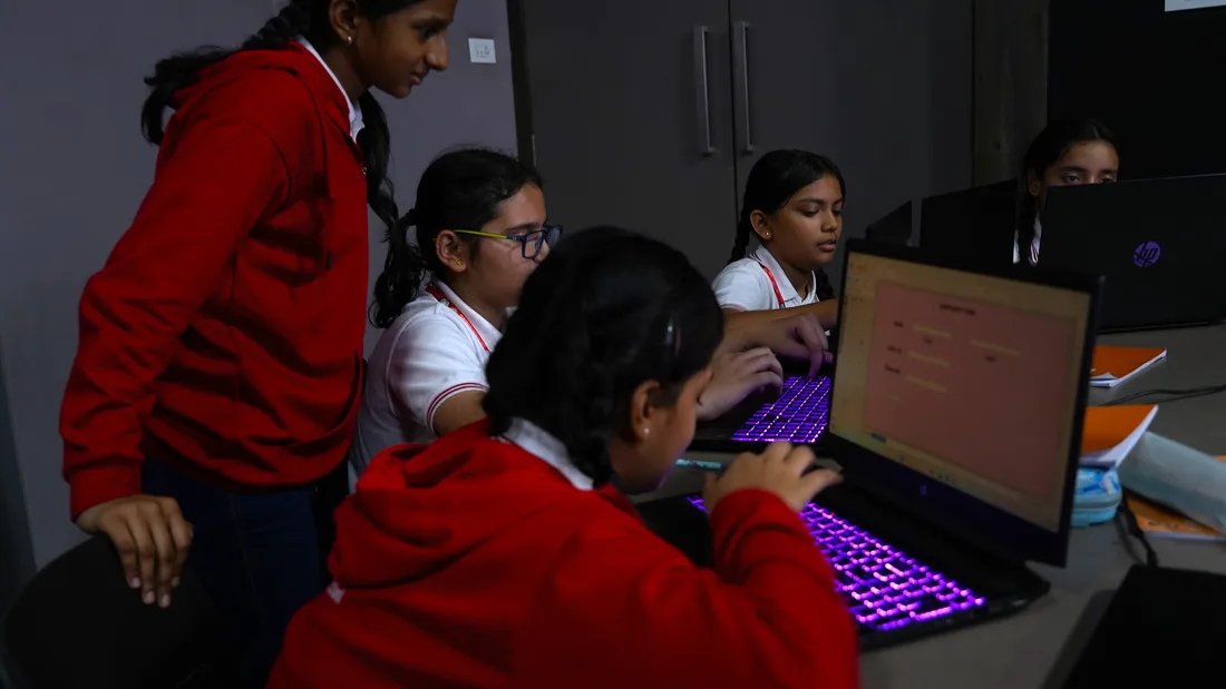 Secondary students using tablets in class