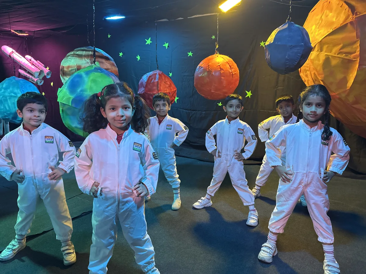 Pre-Primary children dressed as planets during a space-themed activity