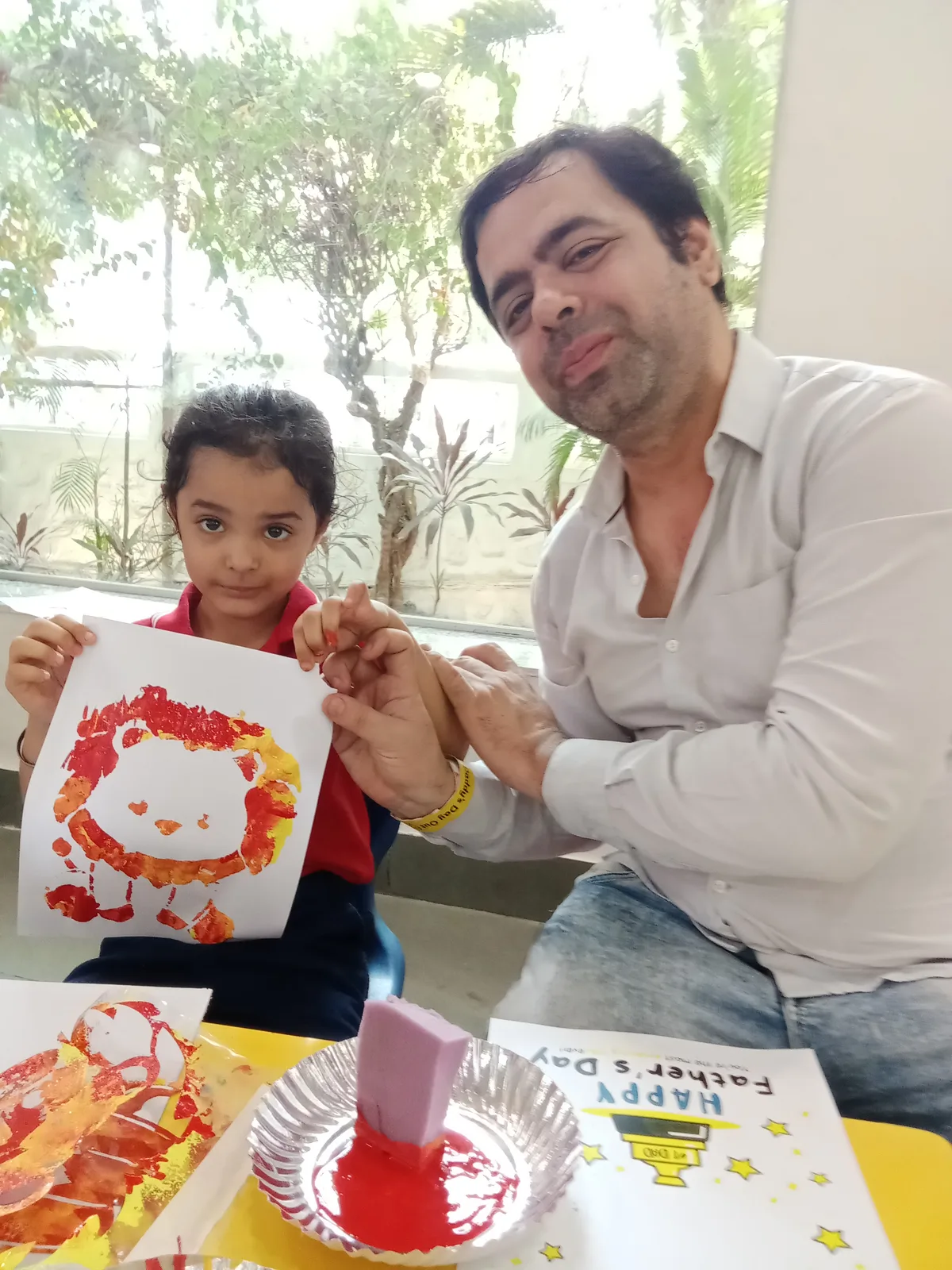 A Pre-Primary child with their father on Father's Day