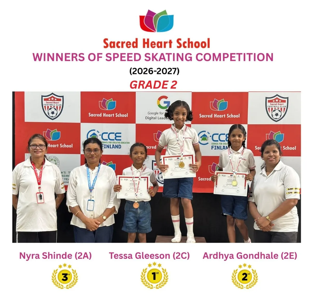 Grade 2 girls' winners of the Speed Skating Competition on the podium