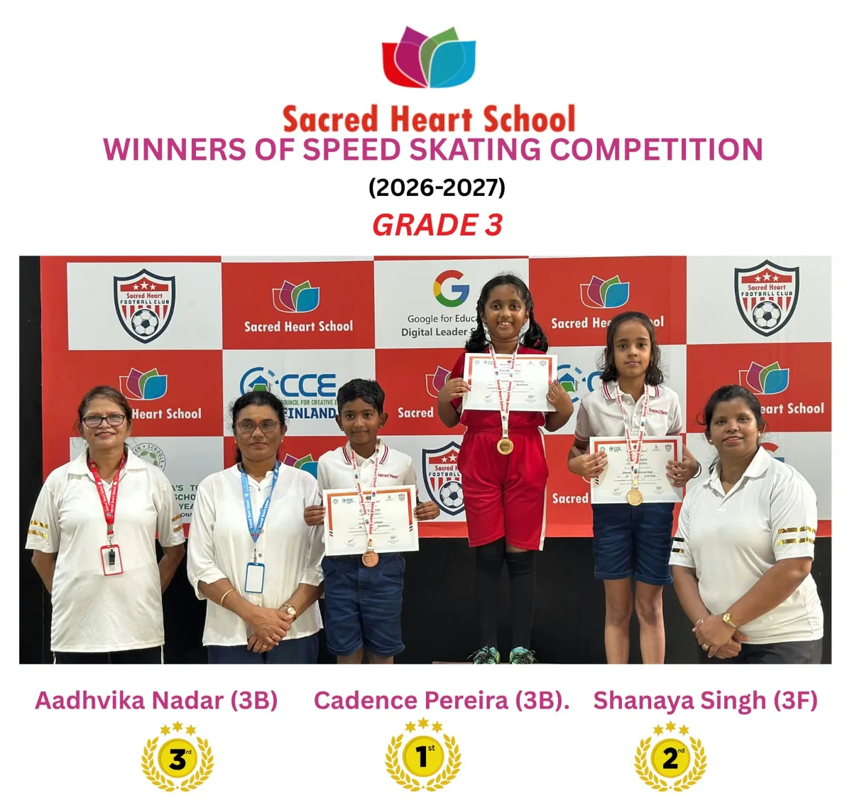 Grade 3 girls' winners of the Speed Skating Competition on the podium