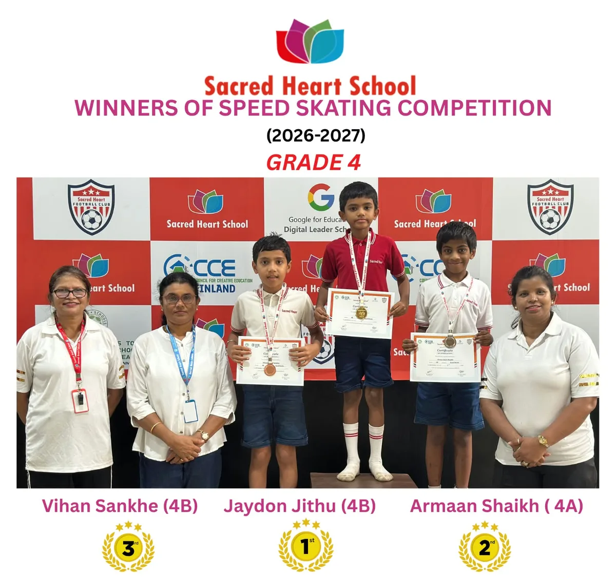 Grade 4 boys' winners of the Speed Skating Competition on the podium