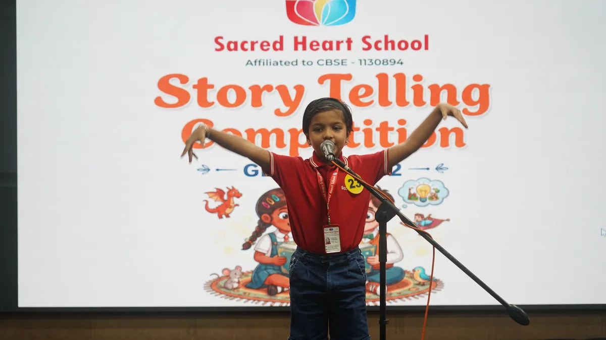 A Primary student on stage at the Story Telling Competition