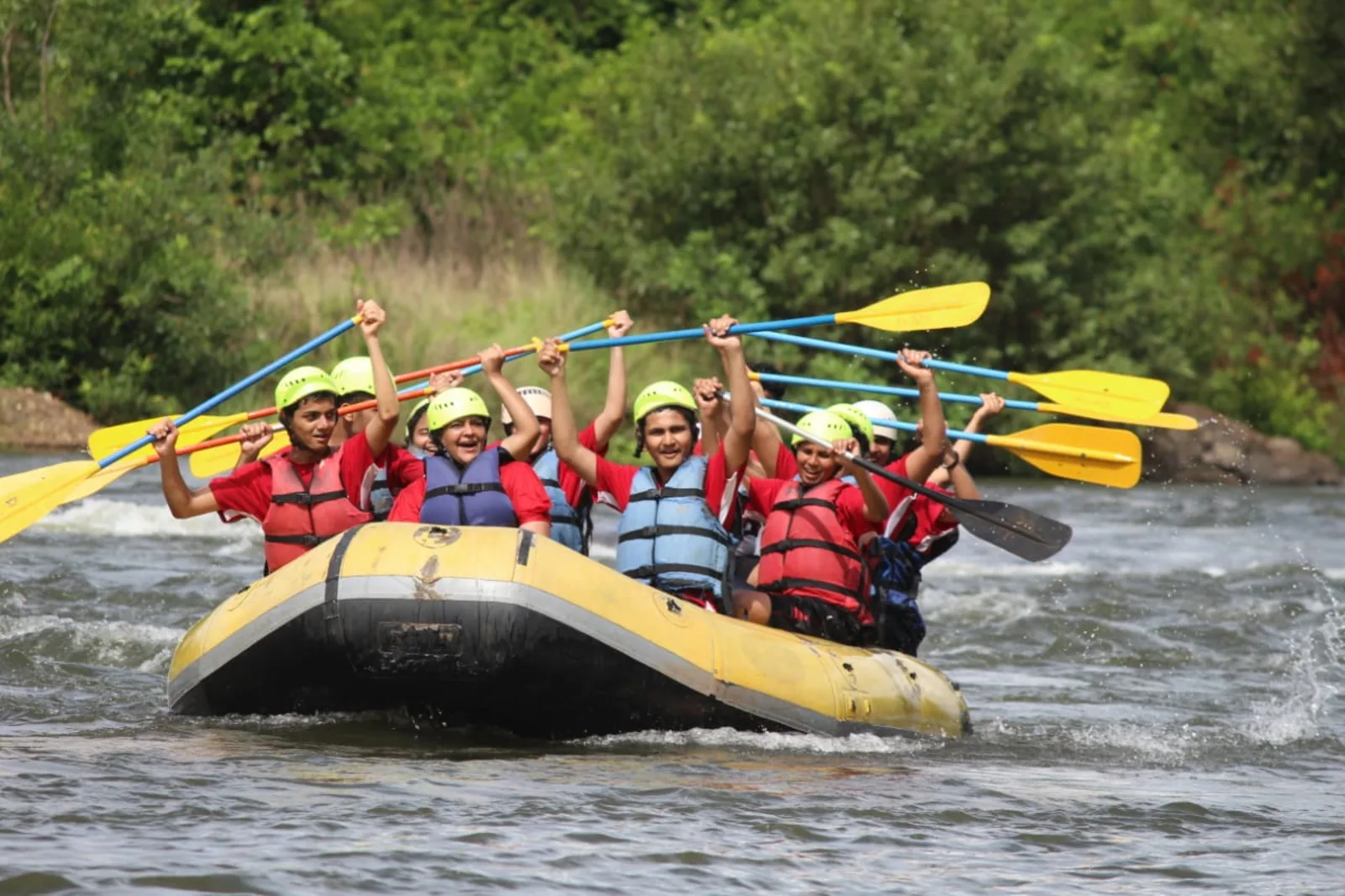 Secondary students white-water river rafting on an expedition