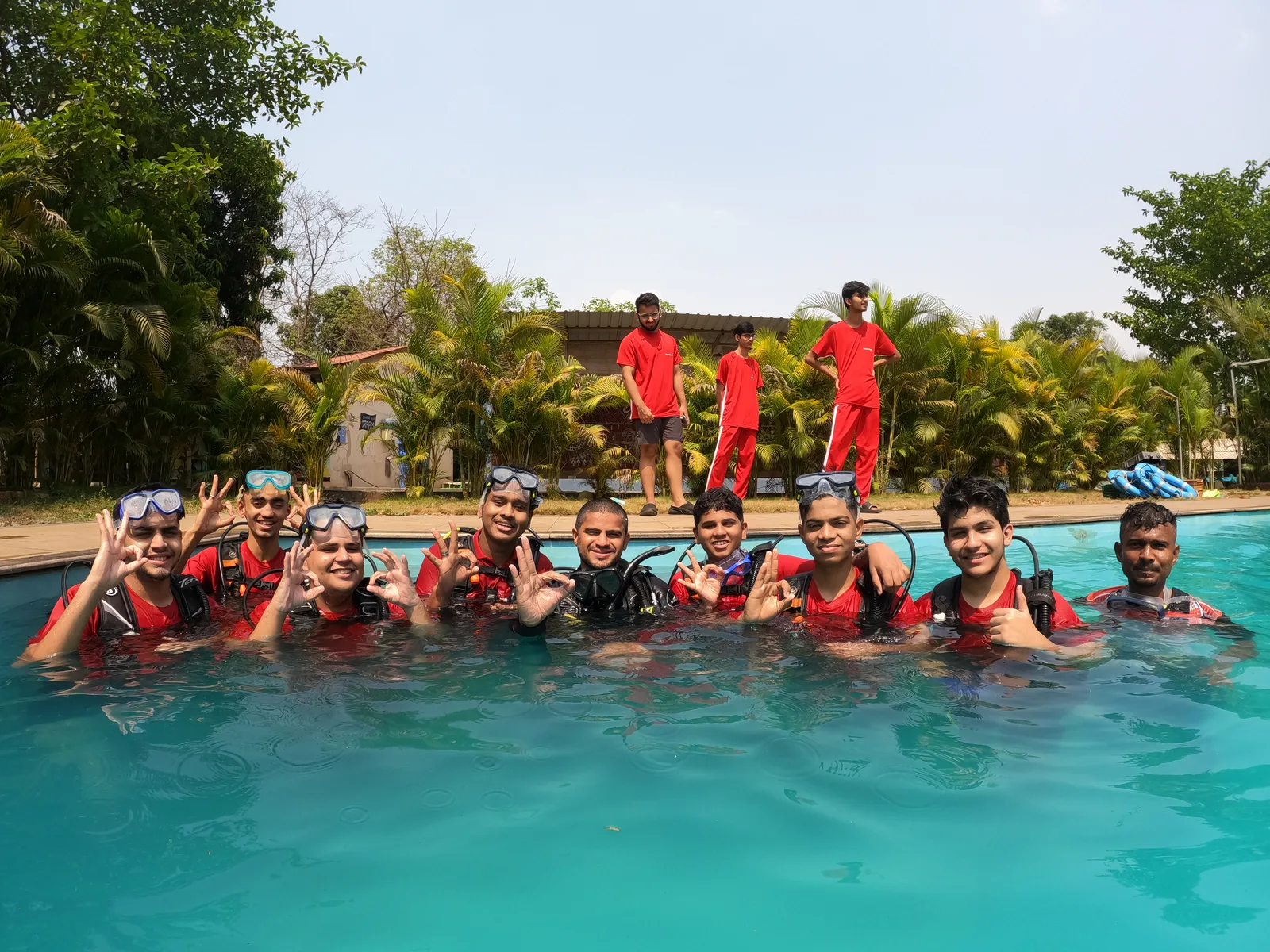 Senior Secondary students scuba diving in a pool